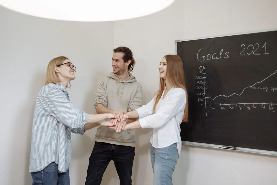 Group of business professionals collaborating in an office setting.